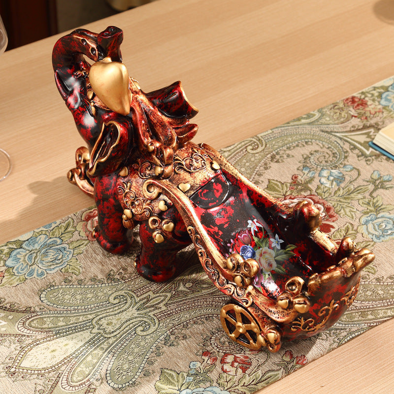 Gorgeously detailed elephant pulling cart wine bottle holder (resin)