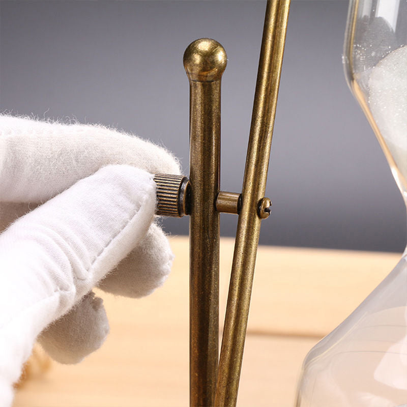 Metal rotating hourglass