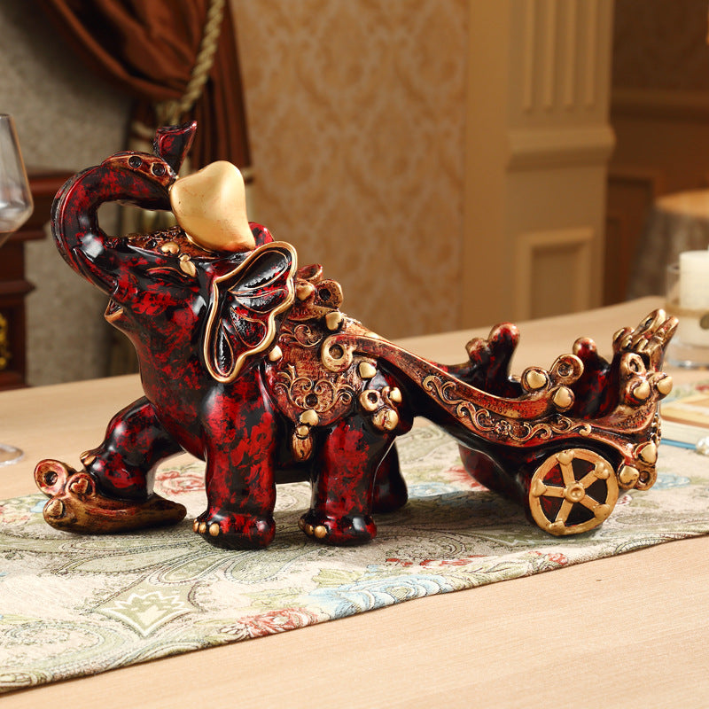 Gorgeously detailed elephant pulling cart wine bottle holder (resin)