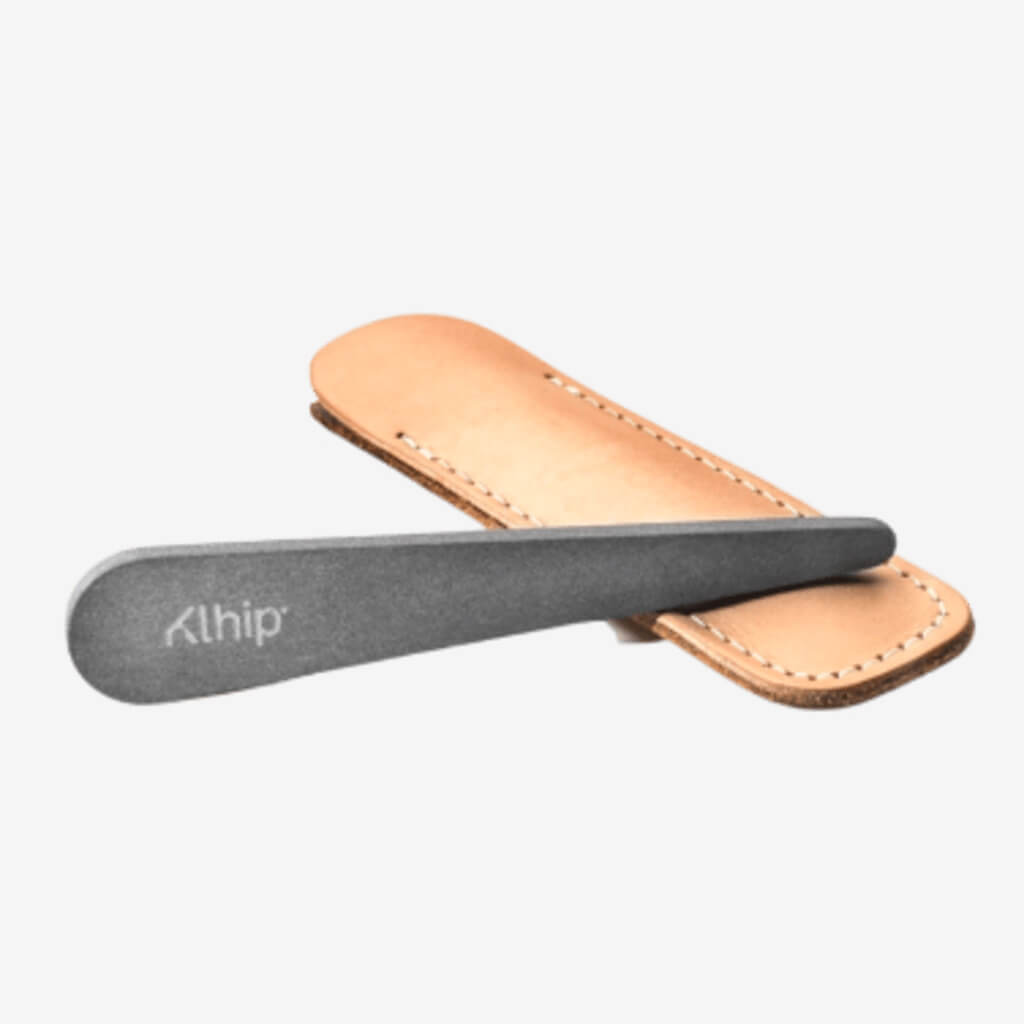 Carved from natural stone, the Klhip Natural Stone Nail File offers a two-textured surface to maintain and polish your nails.   Features:  Smooth front face Coarse backside  Crafted with natural stone Compact and easy to transport  Durable and long-lasting  Leather pouch included Eco-Friendly paper tube packaging   *Natural item and variations in patterns are expected