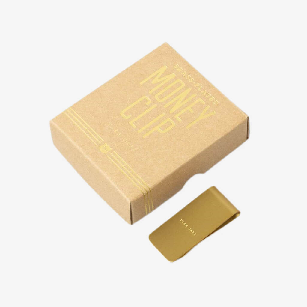 Your receipts, business cards and family photos are on your phone. It’s about time you trim the fat, ditch that bulky wallet, and get with the (money clip) program. Brass construction. Gold foil stamped gift box, perfect for gifting.