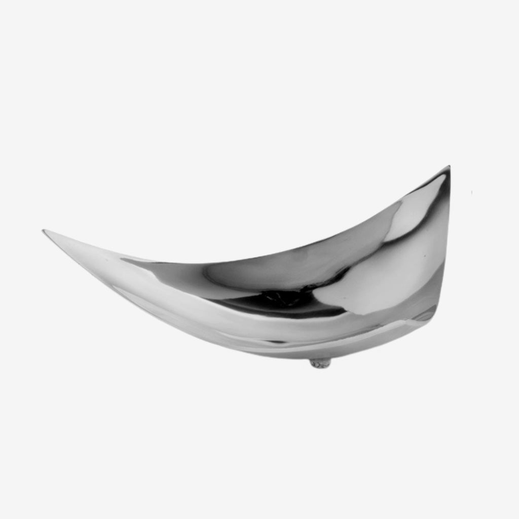 Our Trigon Tray is a Triangle Shape Cast Aluminum Footed Bowl. This version has a ALL Polished Shiny Finish. Great for a Console or as a Centerpiece. The three corners are slightly curved enabling a comfortable fit for Spheres or other type of Filler.