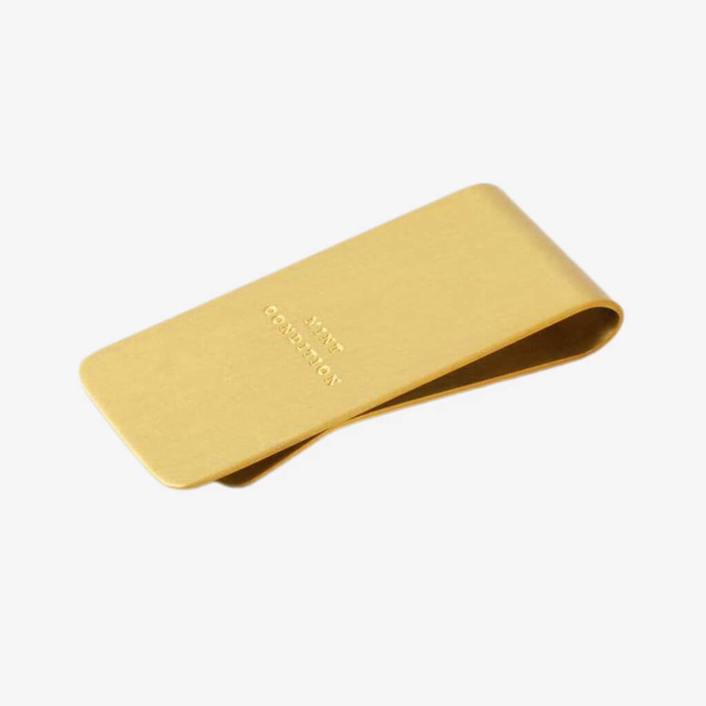 Your receipts, business cards and family photos are on your phone. It’s about time you trim the fat, ditch that bulky wallet, and get with the (money clip) program. Brass construction. Gold foil stamped gift box, perfect for gifting.