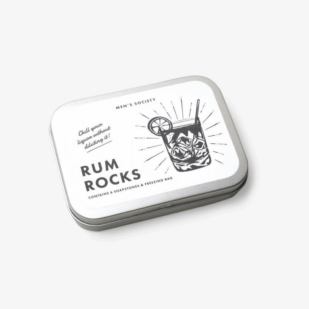 Rum Rocks are a great alternative to ice. Drop them in your Rum or any tipple, to chill your drink without diluting. Made from 100% Soapstone, which harbours less bacteria and fewer impurities than ice. These rum rocks can be reused time and time again, just wash and freeze again in their bag. Suitable for: The sophisticated drinker. The spirit collector. The man of the world. Contains: Cotton Bag 6 Rum Rocks