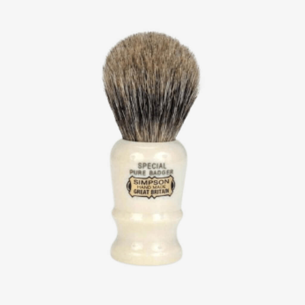 Made with slightly coarser and shorter hairs, the Simpsons Case Pure Badger Shaving Brush offers an invigorating scrub and a compact size. The handmade knot is densely filled with dark hair that exfoliates and raises the beard for a clean and comfortable shave. At 85 millimetres this brush is a great traveller and also allows the shaver to apply lather accurately, helpful when working around facial hair stylings. 