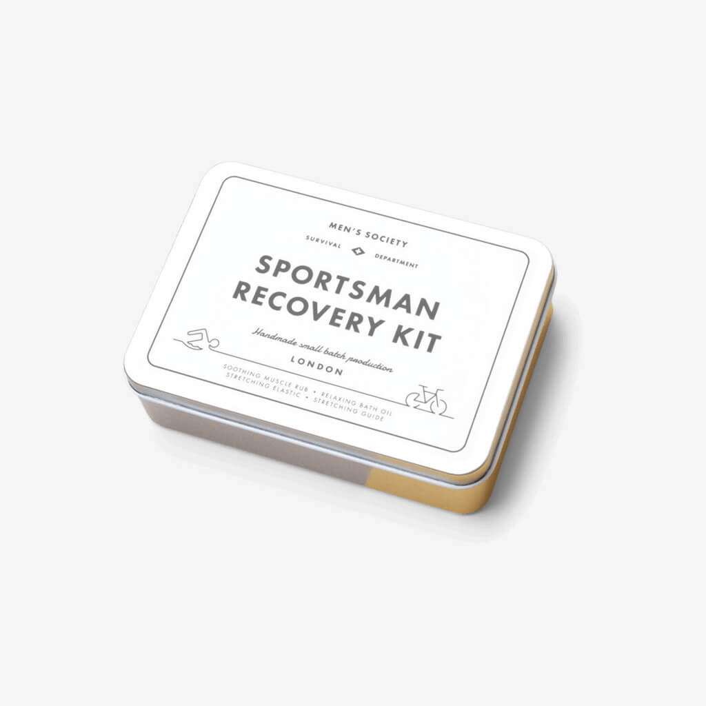 Men&#39;s Society presents a hardworking recovery kit fine-tuned for athletes (or just very sore people). All handmade in London, this set includes a soothing muscle rub, a relaxing bath oil, and old-school stretching elastic — for a complete recovery ritual, in a handsome little tin.  Includes: Soothing muscle rub, relaxing bath oil, stretching elastic  Made in the UK
