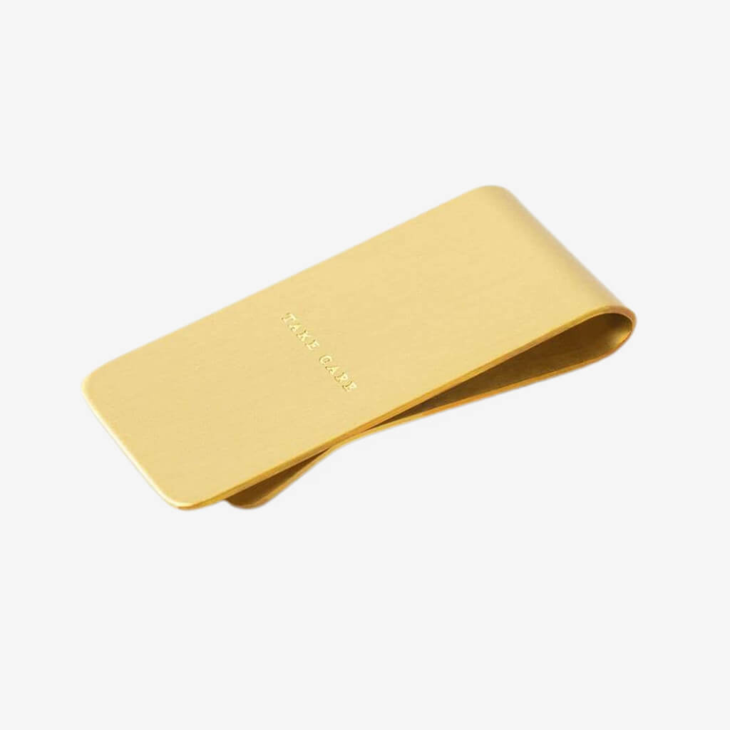 Your receipts, business cards and family photos are on your phone. It’s about time you trim the fat, ditch that bulky wallet, and get with the (money clip) program. Brass construction. Gold foil stamped gift box, perfect for gifting.